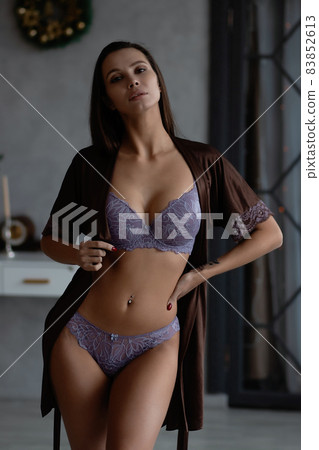Alluring woman in underwear and silk robe Alluring woman in underwear and silk robe 83852613