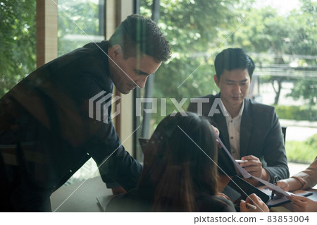 Diversity group of business people are meeting to analyze data for marketing plan, Financial advisor teamwork and accounting concept Diversity group of business people are meeting to analyze data for marketing plan, Financial advisor teamwork and accounting concept 83853004