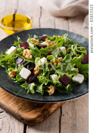 Beetroot salad with feta cheese,lettuce and walnuts Beetroot salad with feta cheese,lettuce and walnuts 83853323