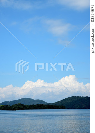 Midsummer sea and sky seen from Kasado Island Midsummer sea and sky seen from Kasado Island 83854672
