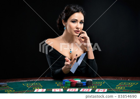 sexy woman with poker cards and chips sexy woman with poker cards and chips 83854690
