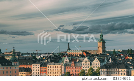Stockholm, Sweden. Scenic Skyline View Of Old Town With Tower Of Storkyrkan - The Great Church Or Church Of St. Nicholas. Stockholm Cathedral Is The Oldest Church In Gamla Stan, The Old Town. Stockholm, Sweden. Scenic Skyline View Of Old Town With Tower Of Storkyrkan - The Great Church Or Church Of St. Nicholas. Stockholm Cathedral Is The Oldest Church In Gamla Stan, The Old Town. 83854691