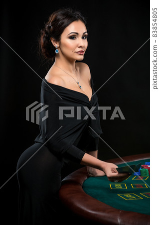 sexy woman with poker cards and chips 83854805