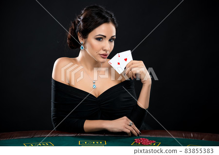 sexy woman with poker cards and chips sexy woman with poker cards and chips 83855383