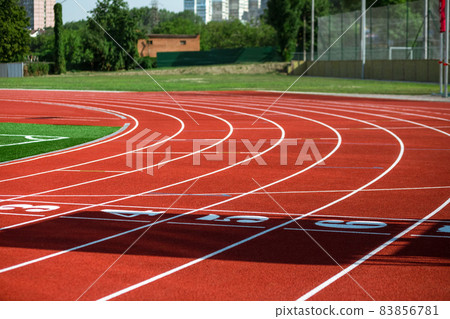 Red treadmill at the stadium with the numbering Red treadmill at the stadium with the numbering 83856781