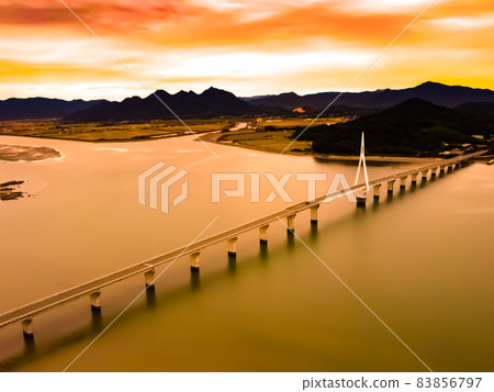 Suo Bridge seen from the sky above Mt. Fujio in the evening Suo Bridge seen from the sky above Mt. Fujio in the evening 83856797