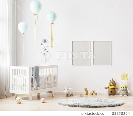 Blank poster frames mock up on white wall in nursery room interior background with baby bedding, soft toys, balloons, 3d rendering 83858294