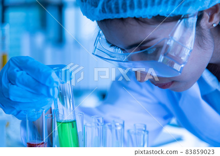 Asian young women in the chemistry laboratory in the science 83859023