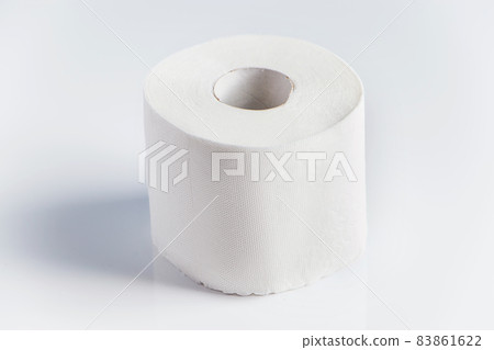 One roll of toilet paper on a white background. Panic purchase of essential goods. Place for text. One roll of toilet paper on a white background. Panic purchase of essential goods. Place for text. 83861622