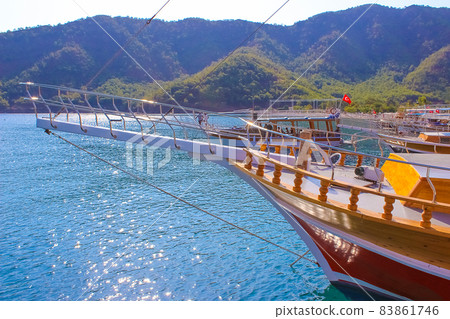 Yacht on the shore of the cozy bay of Adrasan, near Antalya and Kemer, Turkey 83861746