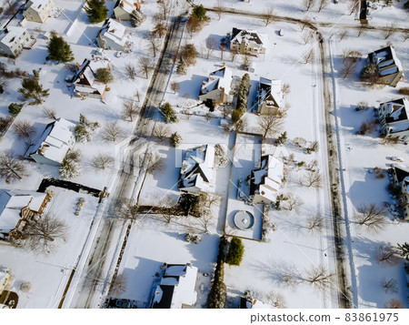 Panoramic view on snow covered residential district home complex winter day 83861975