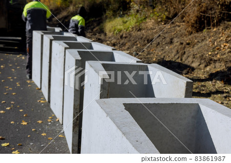 Road worker mounting U-ditch, U-shaped water channel construction Road worker mounting U-ditch, U-shaped water channel construction 83861987