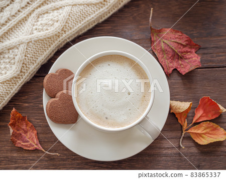 Latte and heart-shaped chocolate cookies Latte and heart-shaped chocolate cookies 83865337