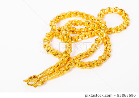 Gold necklace on white. Gold necklace on white. 83865690