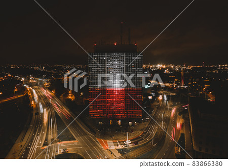 One of the buildings in Gdansk in the colors of the flag of Poland. November 11, 2021. Independence Day One of the buildings in Gdansk in the colors of the flag of Poland. November 11, 2021. Independence Day 83866380