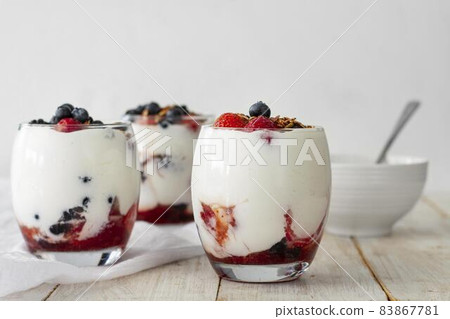 fruit yogurt glasses composition. High quality beautiful photo concept fruit yogurt glasses composition. High quality beautiful photo concept 83867781