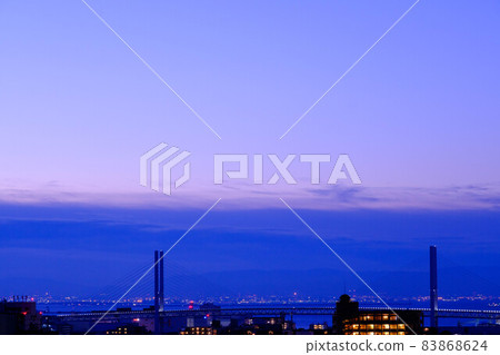 The city before dawn. View of Kobe city and Osaka Bay from Okamoto Bairin Park on a hill in Kobe city The city before dawn. View of Kobe city and Osaka Bay from Okamoto Bairin Park on a hill in Kobe city 83868624