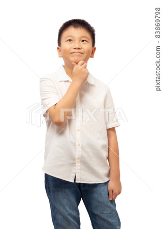 Kid looking up and thinking with hand on chin Kid looking up and thinking with hand on chin 83869798