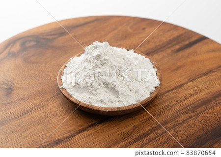 flour in a wooden bowl flour in a wooden bowl 83870654