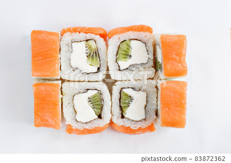 Japanese food, tasty of meal for lunch. Seafood. Philadelphia roll, salmon, soft cheese and kiwi Japanese food, tasty of meal for lunch. Seafood. Philadelphia roll, salmon, soft cheese and kiwi 83872362