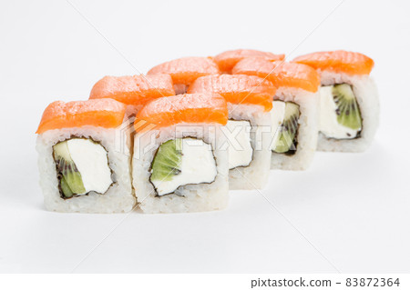 Japanese food, tasty of meal for lunch. Seafood. Philadelphia roll, salmon, soft cheese and kiwi Japanese food, tasty of meal for lunch. Seafood. Philadelphia roll, salmon, soft cheese and kiwi 83872364