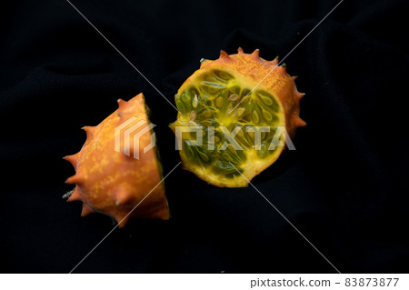 Kiwano spooky fruit cross-section image photo black background Kiwano spooky fruit cross-section image photo black background 83873877