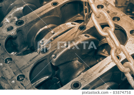 Black and White Bottom Crankshaft in Cylinder Block and Chain Black and White Bottom Crankshaft in Cylinder Block and Chain 83874758