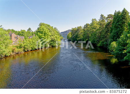 View of the Caledonian Canal where it enters Loch Ness at Fort Augustus 83875272