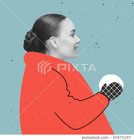 Contemporary art collage of beautiful woman in drawn red down-padded coat making snowball isolated over blue background. Concept of winter season 83875297