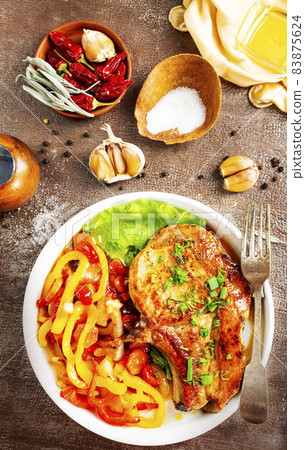 grilled sliced steak and spice on table, top view 83875624