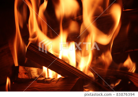 Burning flame / fireplace (winter night image) 83876394