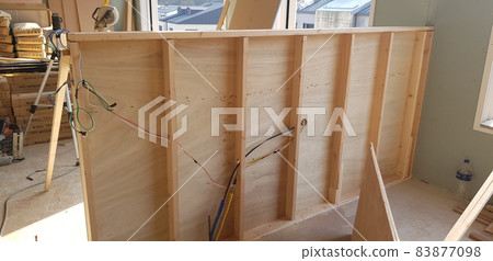 Construction. Construction site. Woodworking. Interior. Wall surface. Stairs. Ceiling work. Construction. Construction site. Woodworking. Interior. Wall surface. Stairs. Ceiling work. 83877098