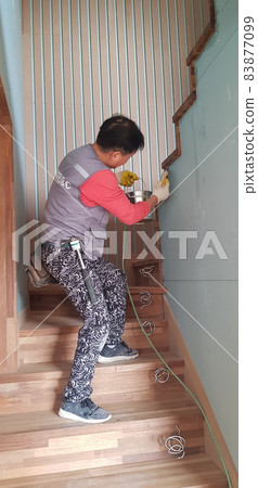 Construction. Construction site. Woodworking. Interior. Wall surface. Stairs. Ceiling work. Construction. Construction site. Woodworking. Interior. Wall surface. Stairs. Ceiling work. 83877099