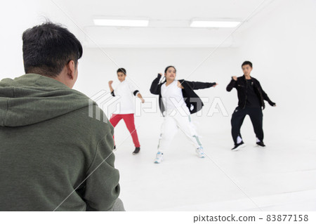 dance teacher training watching kids practice dancing in dance studio classroom dance teacher training watching kids practice dancing in dance studio classroom 83877158