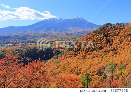 Snow-capped Mt. Mitake seen from Kaida Kogen Kuzo Pass in autumn 83877368