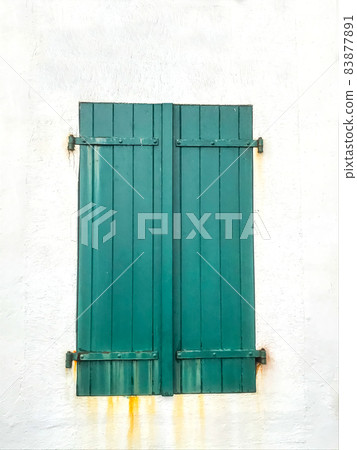 Old green shutter on a white house facade Old green shutter on a white house facade 83877891