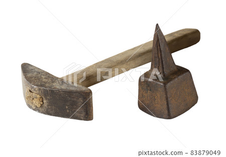 Old metal anvil for punching a hand scythe 83879049