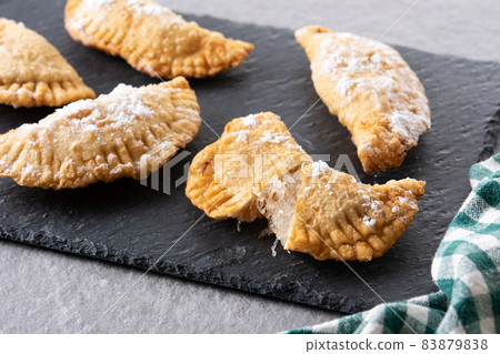 Spanish sweet stuffed pastry filled with angel hair Spanish sweet stuffed pastry filled with angel hair 83879838