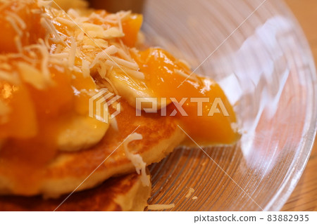 Cute and gorgeous mango coconut pancake 83882935