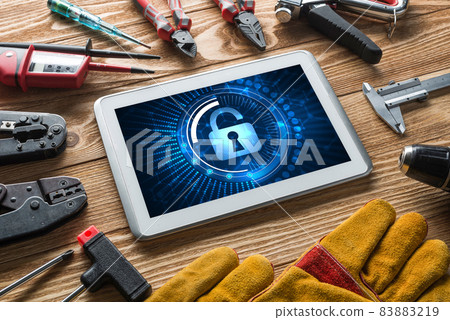 Web security and technology concept with tablet pc on wooden table 83883219