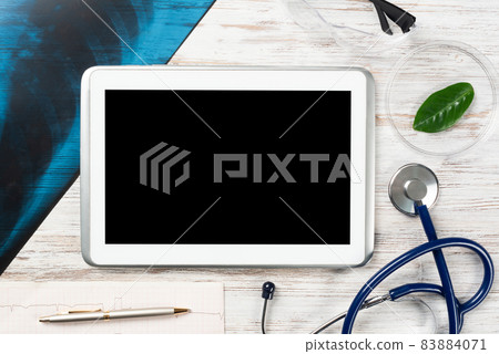 Mock up of doctors desktop with medical supplies Mock up of doctors desktop with medical supplies 83884071