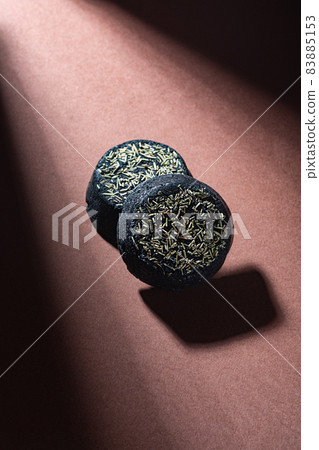 Black solid natural shampoo bars, zero waste concept on dark background Black solid natural shampoo bars, zero waste concept on dark background 83885153