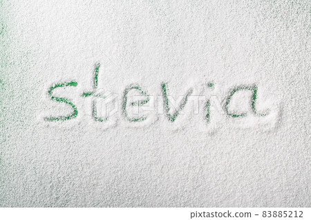Scattered organic stevia powder sweetener with lettering 83885212