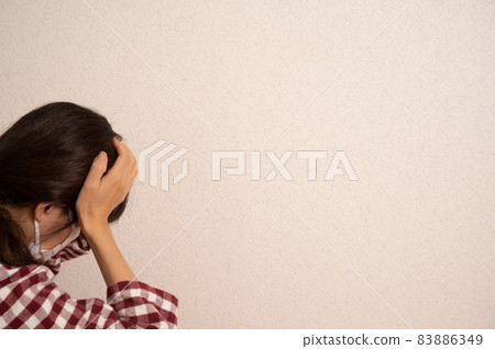 Senior woman suffering from headache 83886349