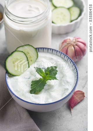 Traditional Indian Raita with Dahi in a bowl. Close up shot 83886458