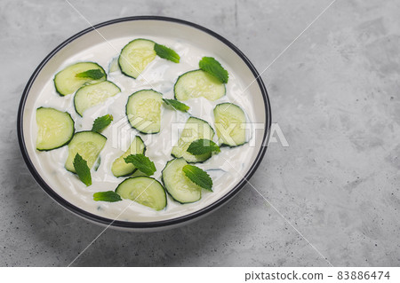 Traditional Indian Raita with Dahi in a bowl Traditional Indian Raita with Dahi in a bowl 83886474