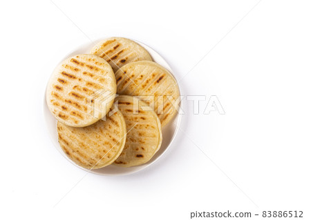 Traditional Venezuelan food arepa made from cornmeal Traditional Venezuelan food arepa made from cornmeal 83886512