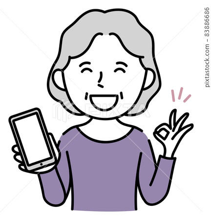 A smiling senior woman operating a smartphone A smiling senior woman operating a smartphone 83886686
