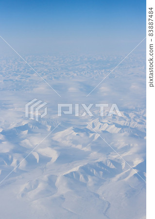 Aerial view of snow-capped mountains 83887484
