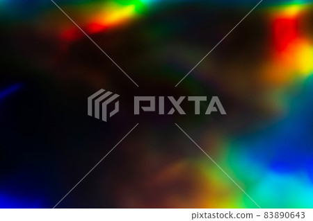 colorful rainbow crystal light leaks on black background 83890643